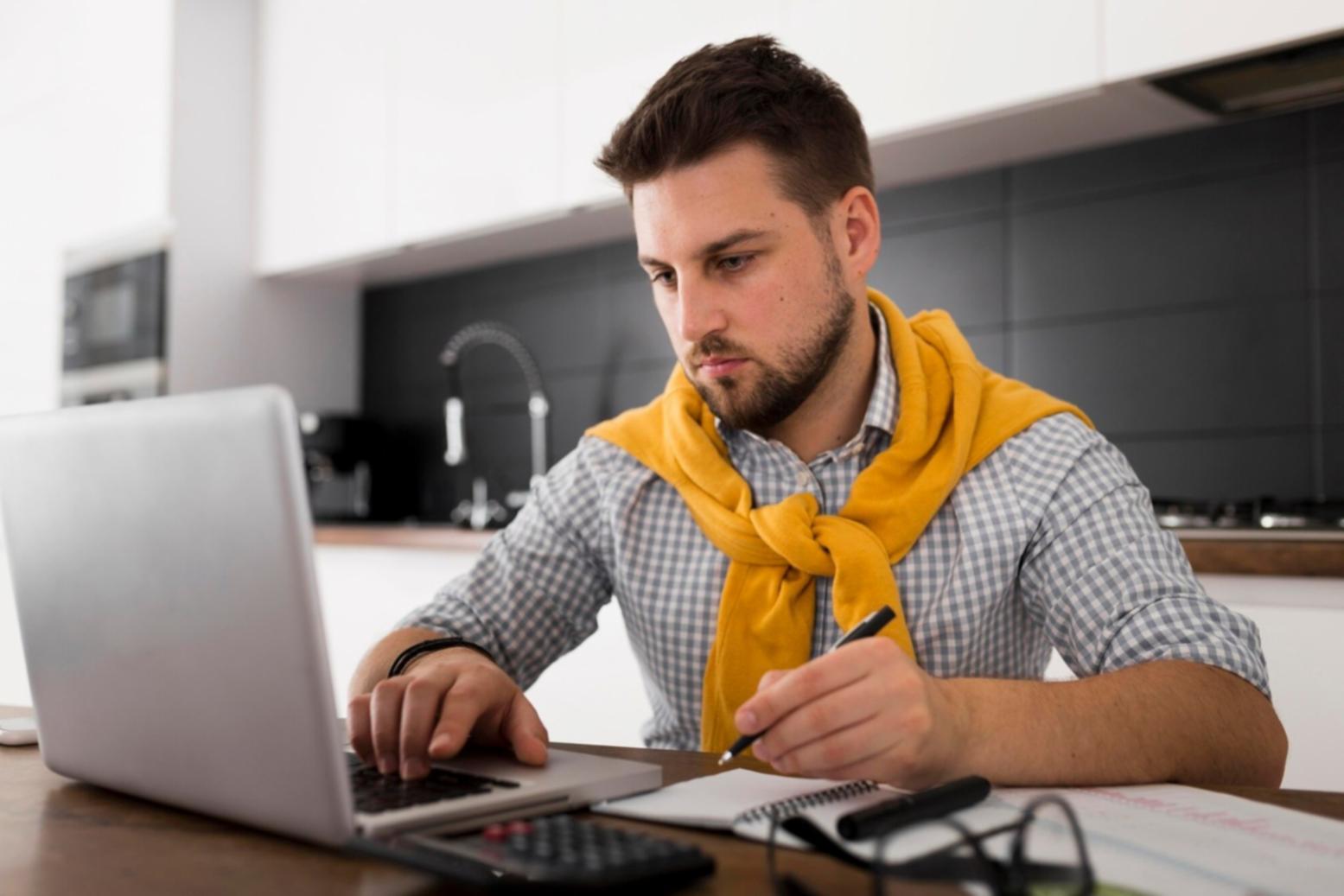 Person reviewing financial documents with a calm, focused expression
